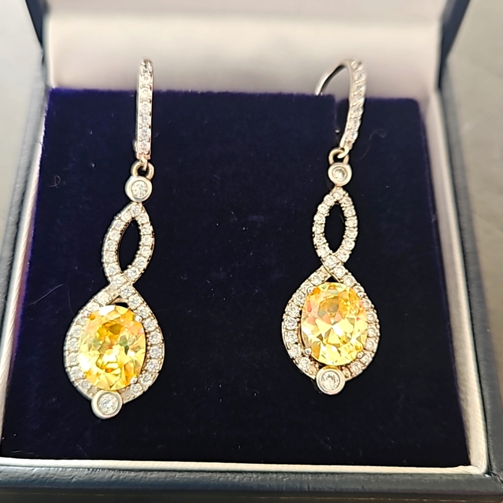 925 silver earrings. Yellow and white czs